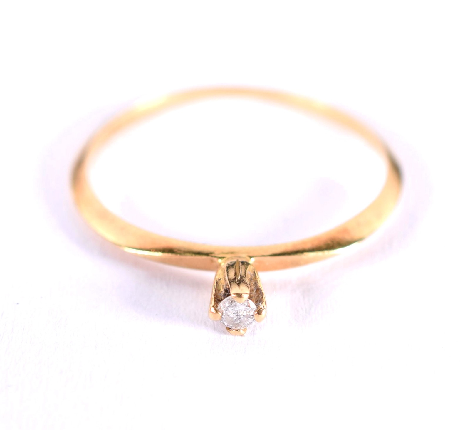 Anel solitário em ouro 18 k, com um diamante, aro 16 (Por motivos de... - foto 1 de 4