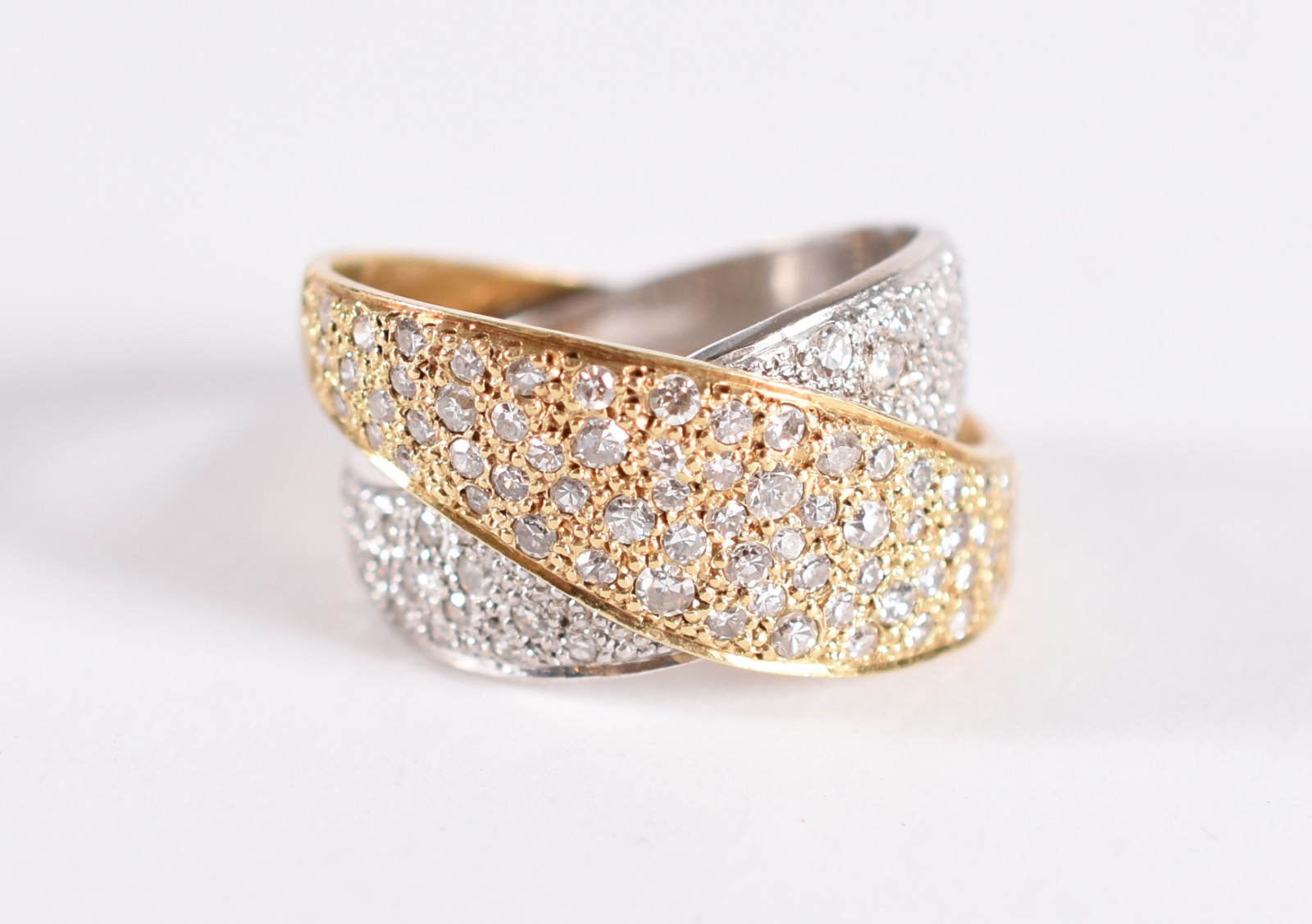 Anel feitio 2 fitas superpostas, uma em ouro 18 k e outra em ouro... - foto 1 de 4