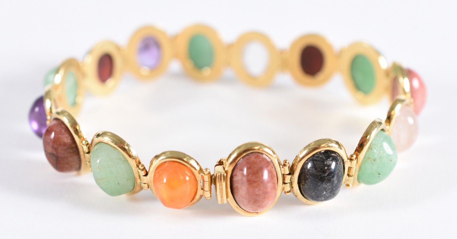 Pulseira em ouro 18 k, contrastada 750, com 16 pedras cabochon... - foto 1 de 6