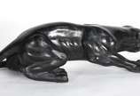 Escultura de material sintético representando f... - Escultura de material sintético representando felino.