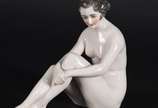 Estatueta de porcelana representando figura fem... - Estatueta de porcelana representando figura feminina