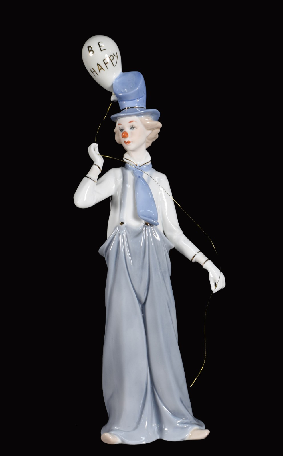 Escultura de porcelana representando palhaço. - foto 1 de 4