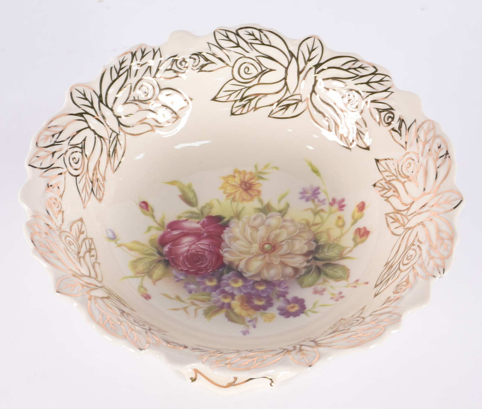 Fruteira de porcelana na cor bege com flores em policromia. - foto 1 de 4