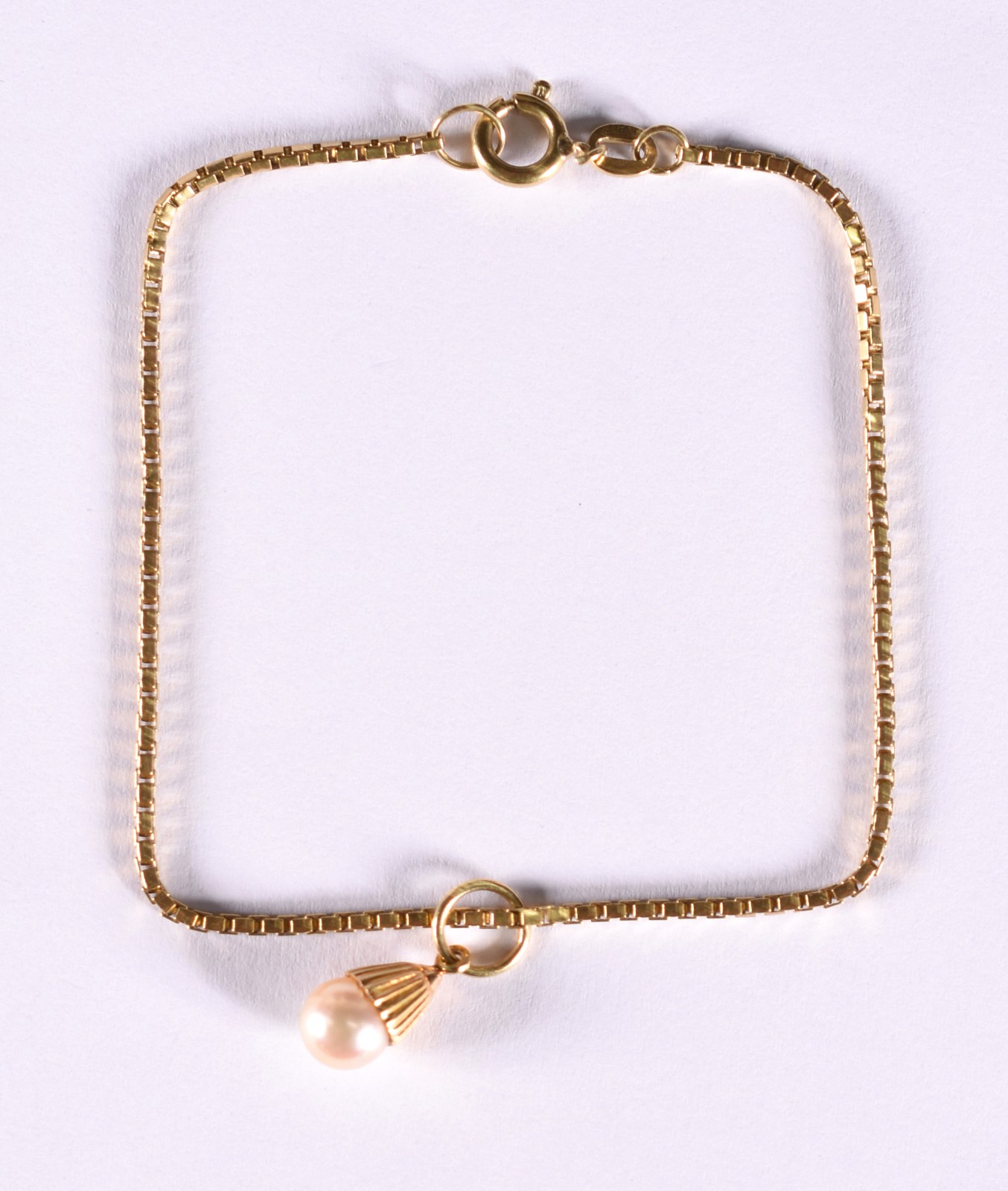 Pulseira de ouro 18 k, contraste 750 e perola cultivada (Por motivos... - foto 2 de 4