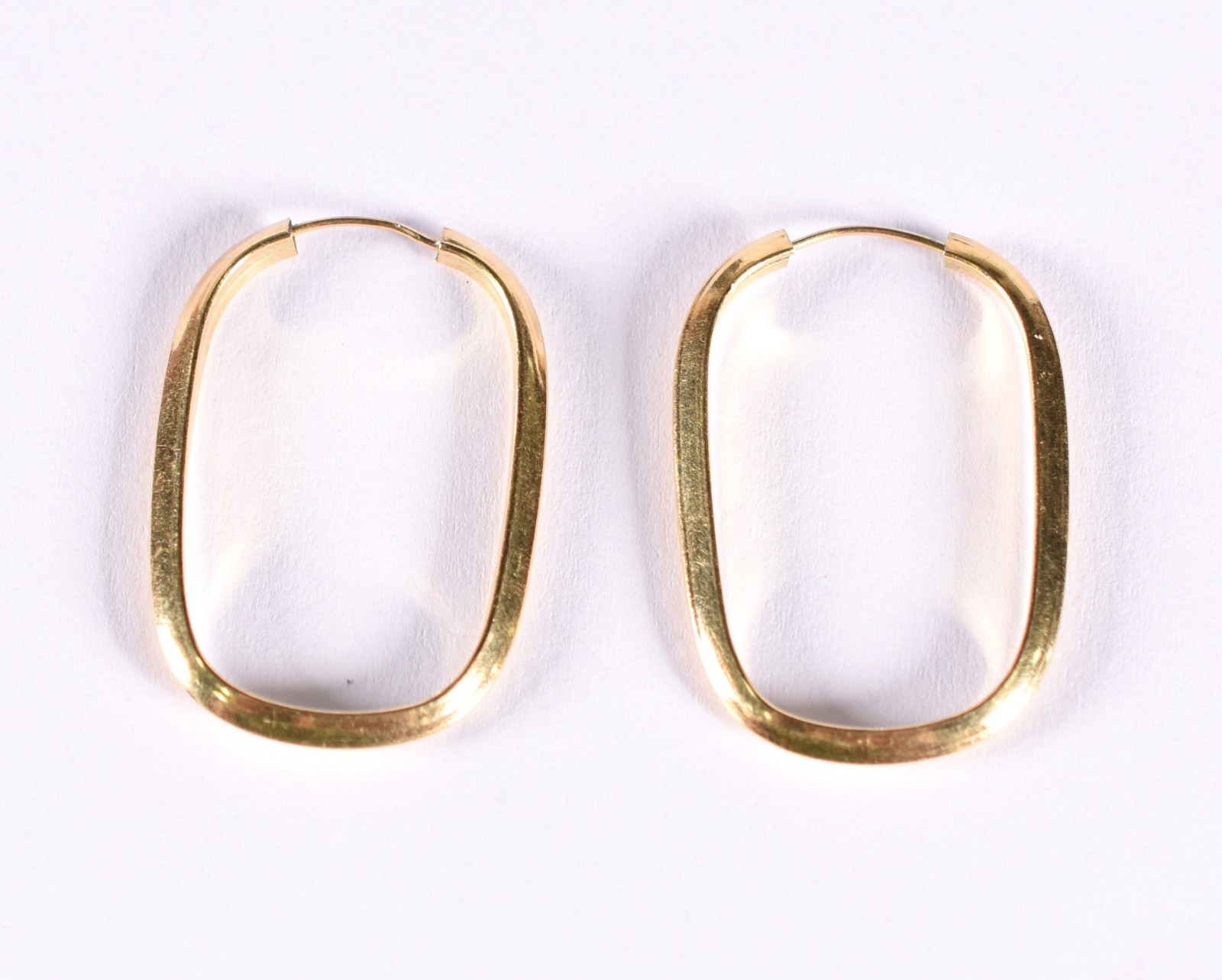 Par de brincos de ouro 18 k, contraste 750 feitio oval (Por motivos... - foto 1 de 3