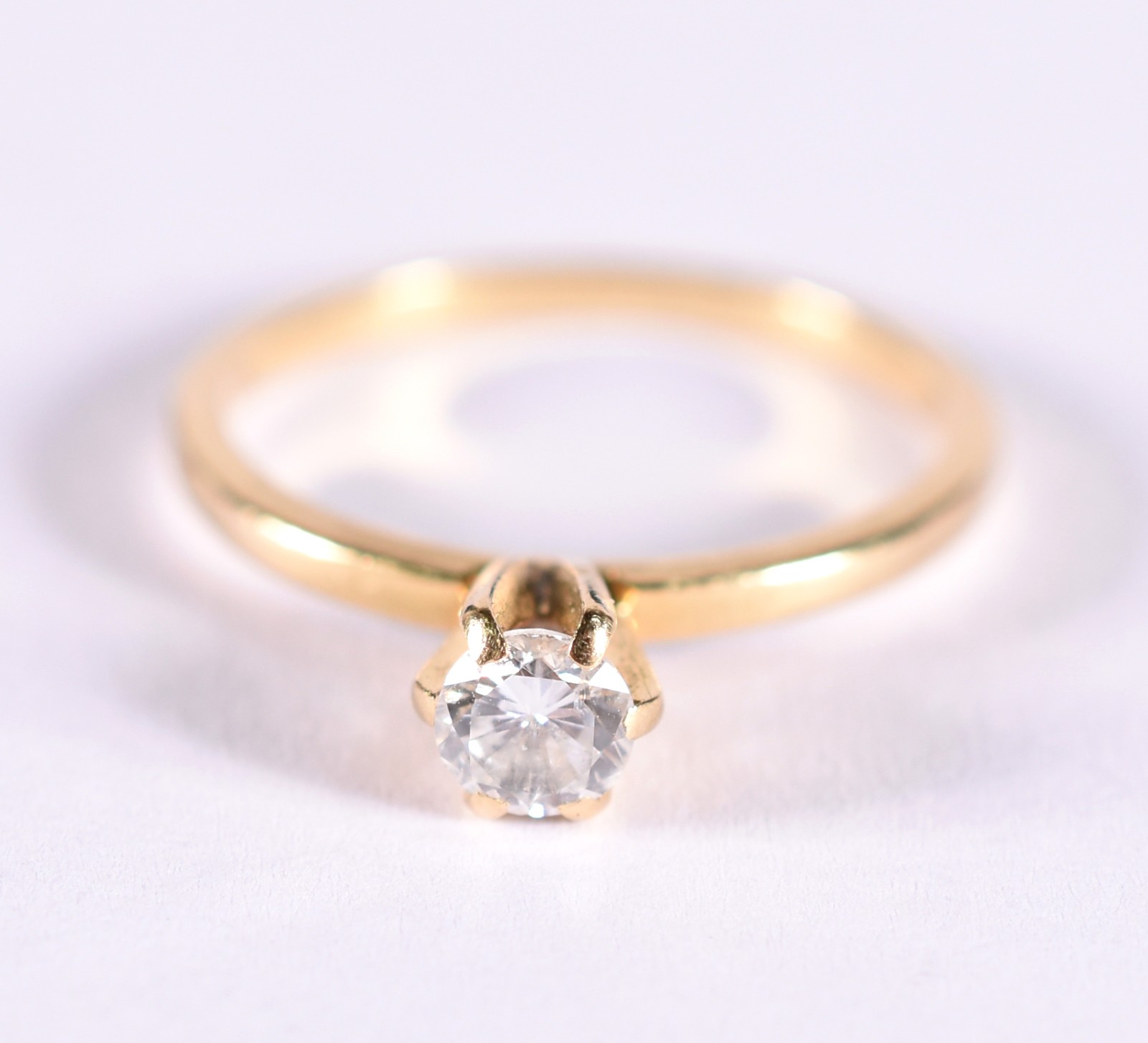 Solitário de ouro 18 k, contraste 750 com 1 brilhante de 0,23 ct, aro... - foto 1 de 4