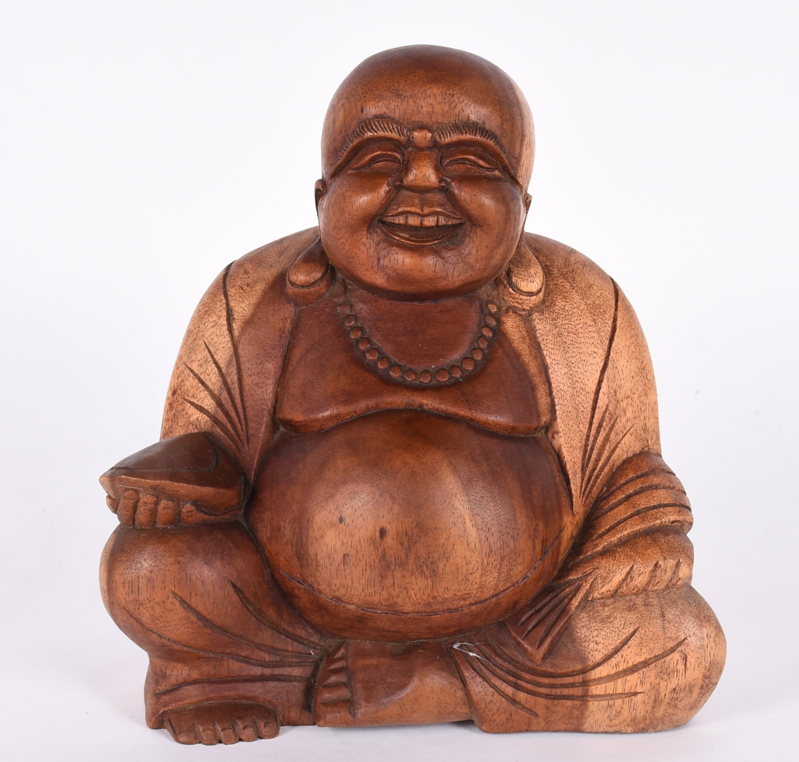 Estatueta representando Buda de madeira entalhada. - foto 1 de 4