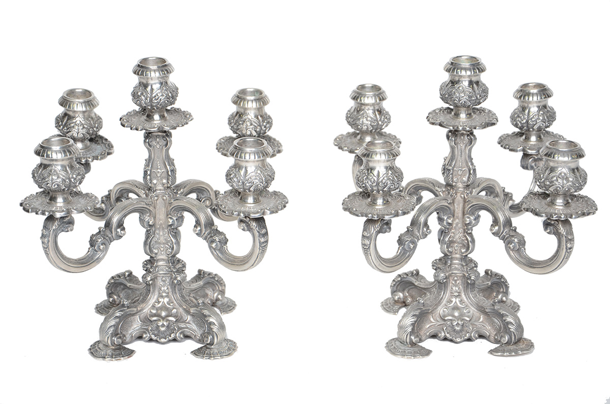 Par de candelabros de prata de lei para 5 velas cada, peso total...