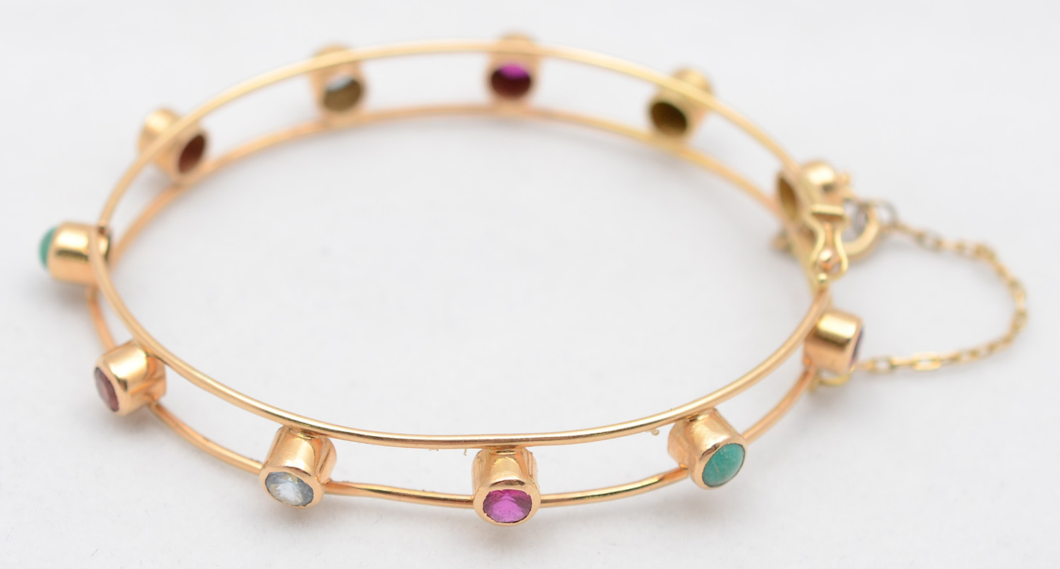 Pulseira de ouro 18 k com pedras - foto 1 de 2