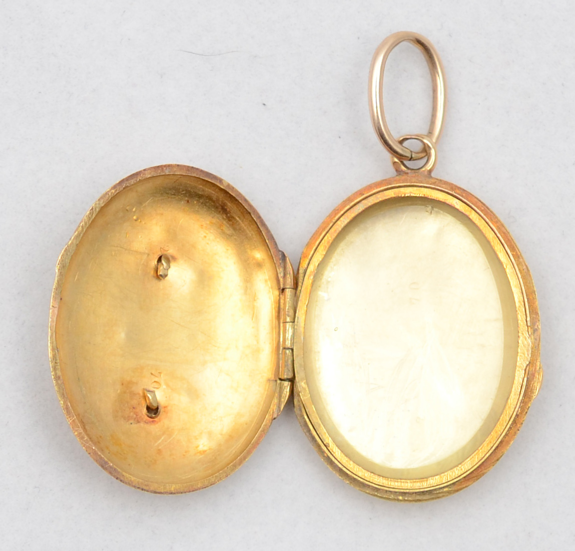 Pedantif na forma de Porta retrato de ouro 18 k com repartição... - foto 2 de 2