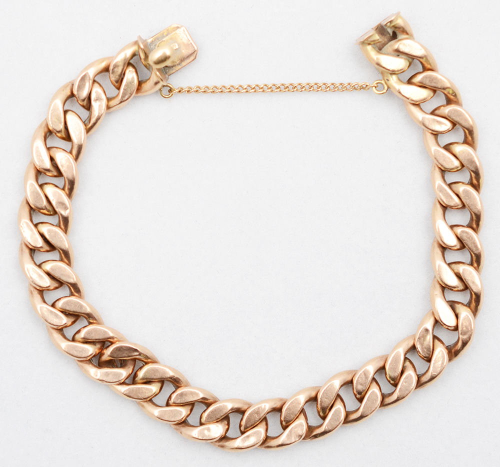 Pulseira de ouro 18 k feitio elos batidos .