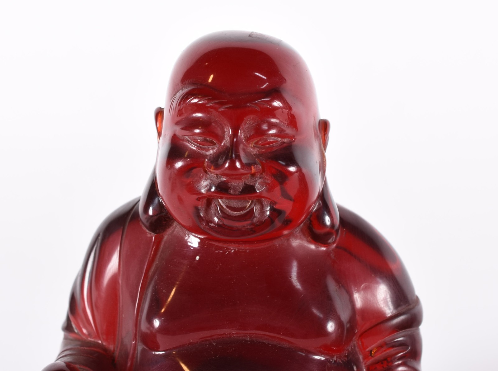 Três figuras de Buda em diversos materiais. - foto 2 de 7