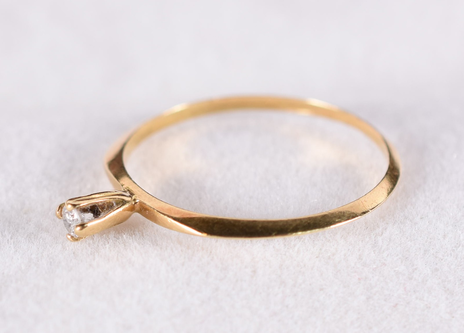 Anel solitário de ouro 18 k com 1 diamante, aro 16(Por motivos de... - foto 2 de 4