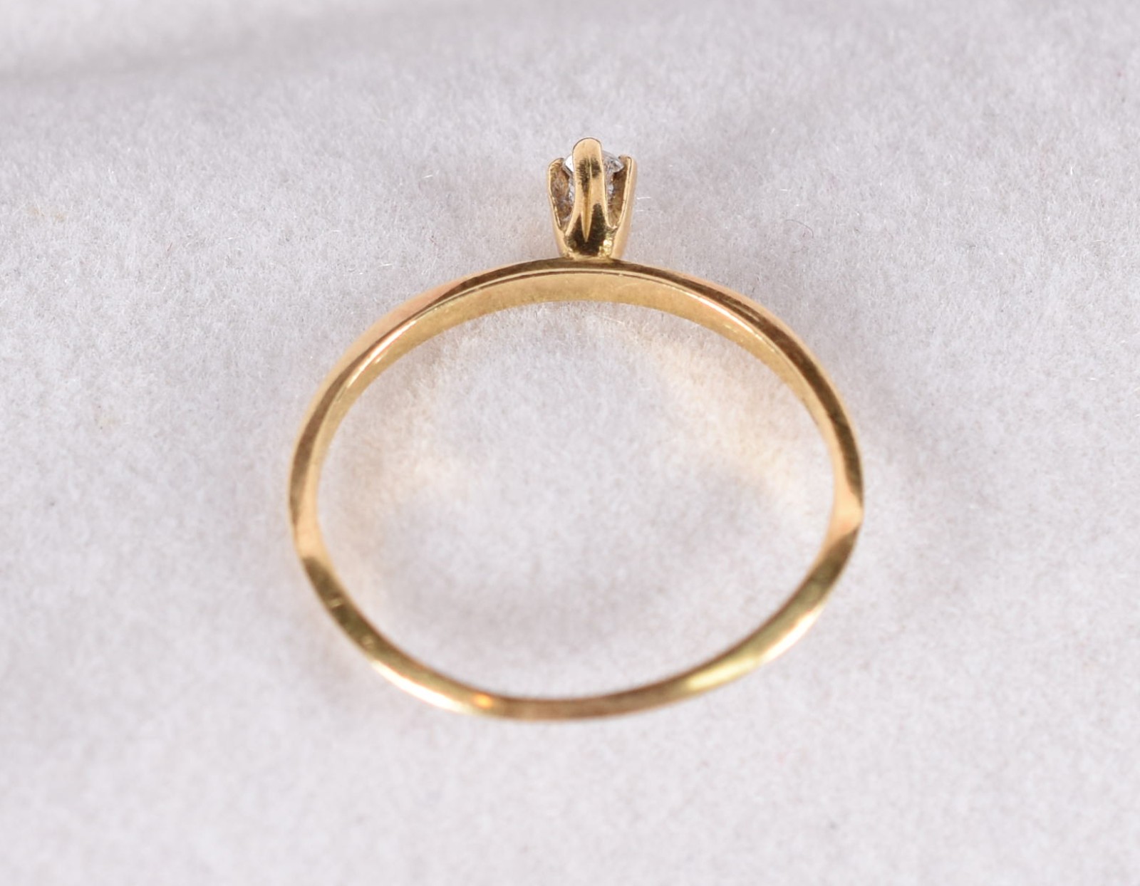 Anel solitário de ouro 18 k com 1 diamante, aro 16(Por motivos de... - foto 3 de 4