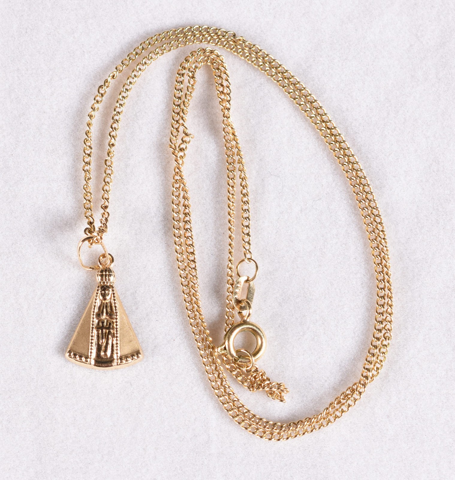 Cordão de ouro 18 k, contraste 750 com pingente de Nossa Senhora de... - foto 4 de 5