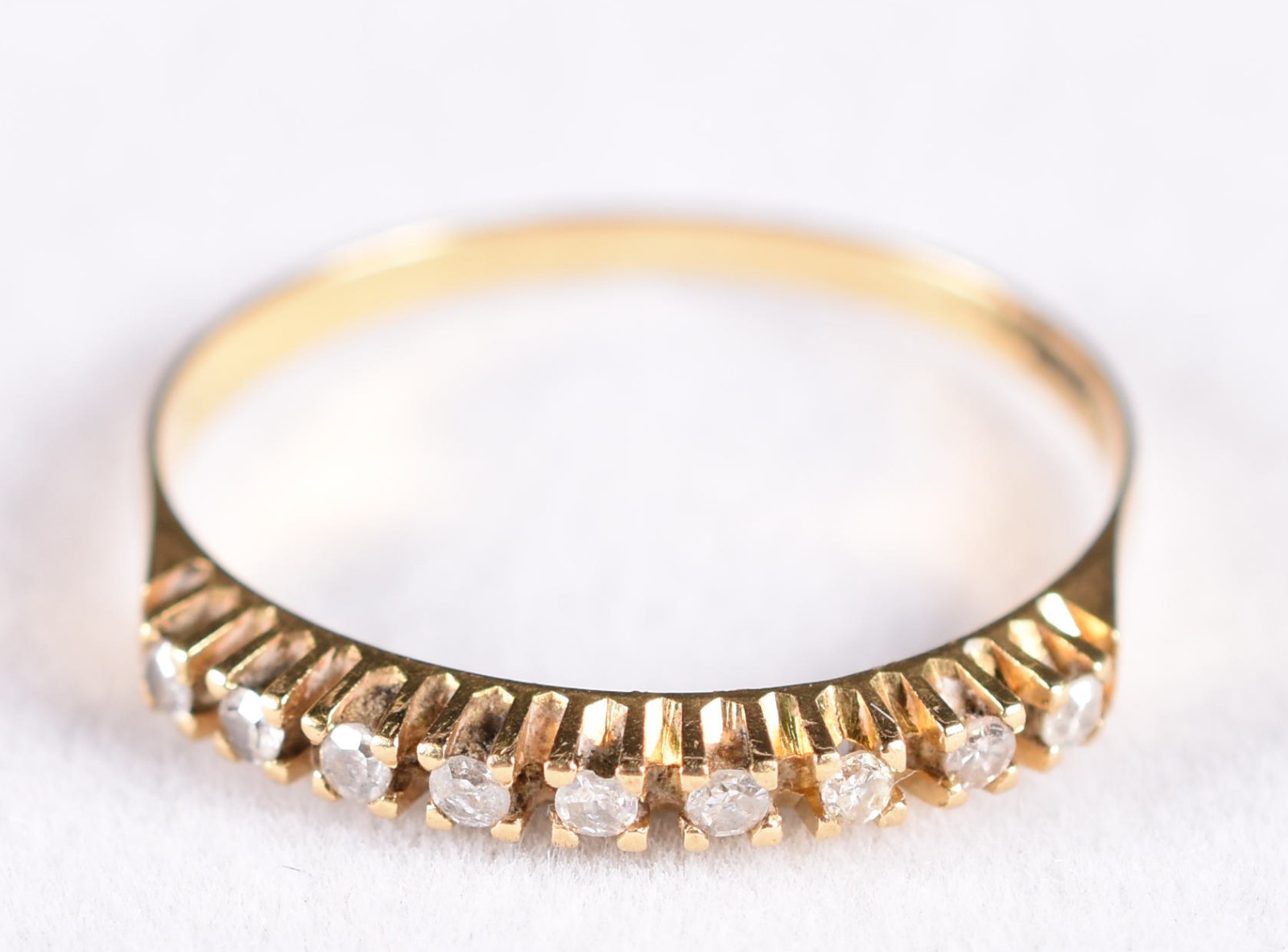 Anel de ouro 18k, contraste 750 com 9 brilhantes, aro 21 (Por motivos... - foto 1 de 4
