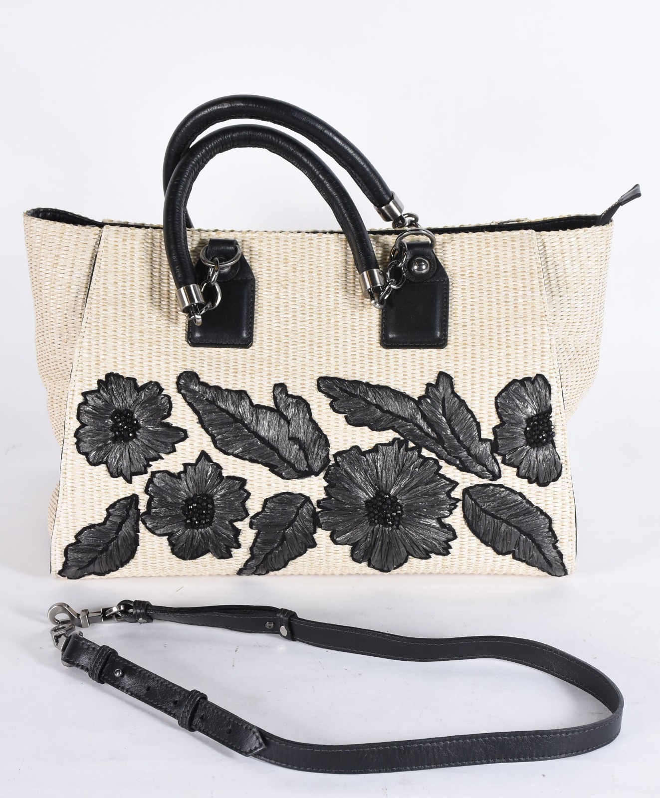 Bolsa feminina com flores e alças escuras, da loja Animale. - foto 2 de 6