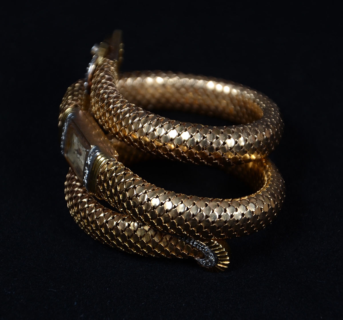 Relógio-pulseira de ouro 18 k em forma de cobra e pedras verdes e... - foto 2 de 3