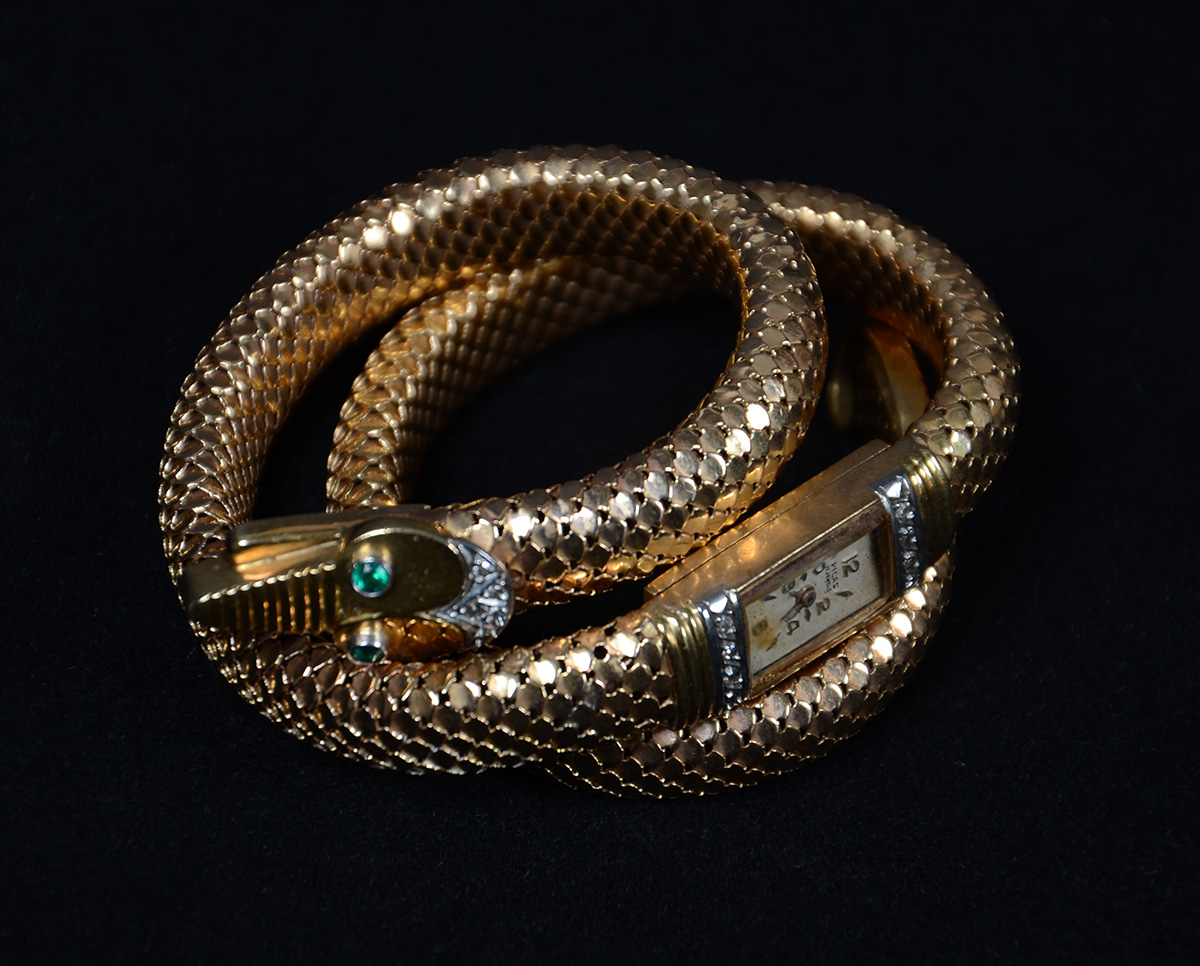 Relógio-pulseira de ouro 18 k em forma de cobra e pedras verdes e... - foto 3 de 3