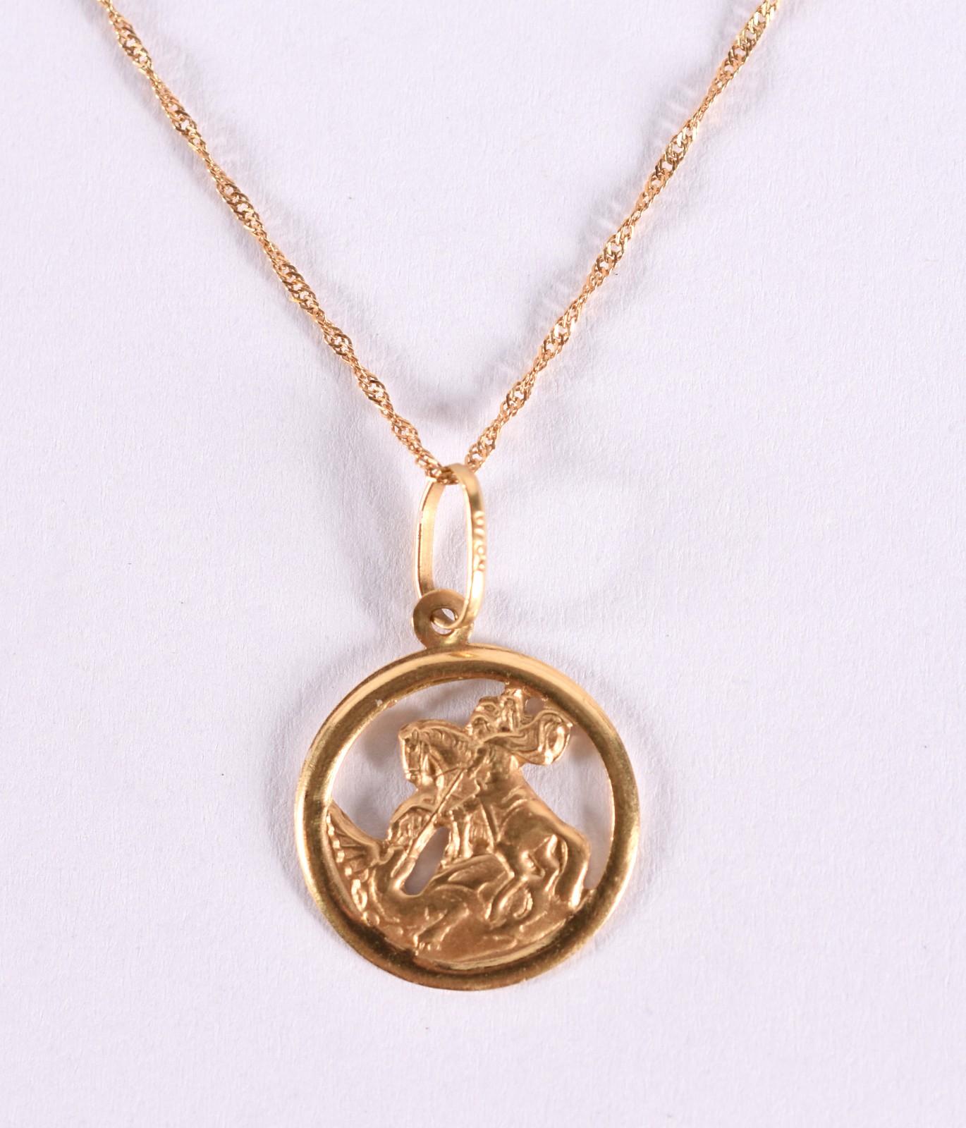 Colar de ouro 18 k, contraste 750 e pingente com imagem de São Jorge... - foto 1 de 5