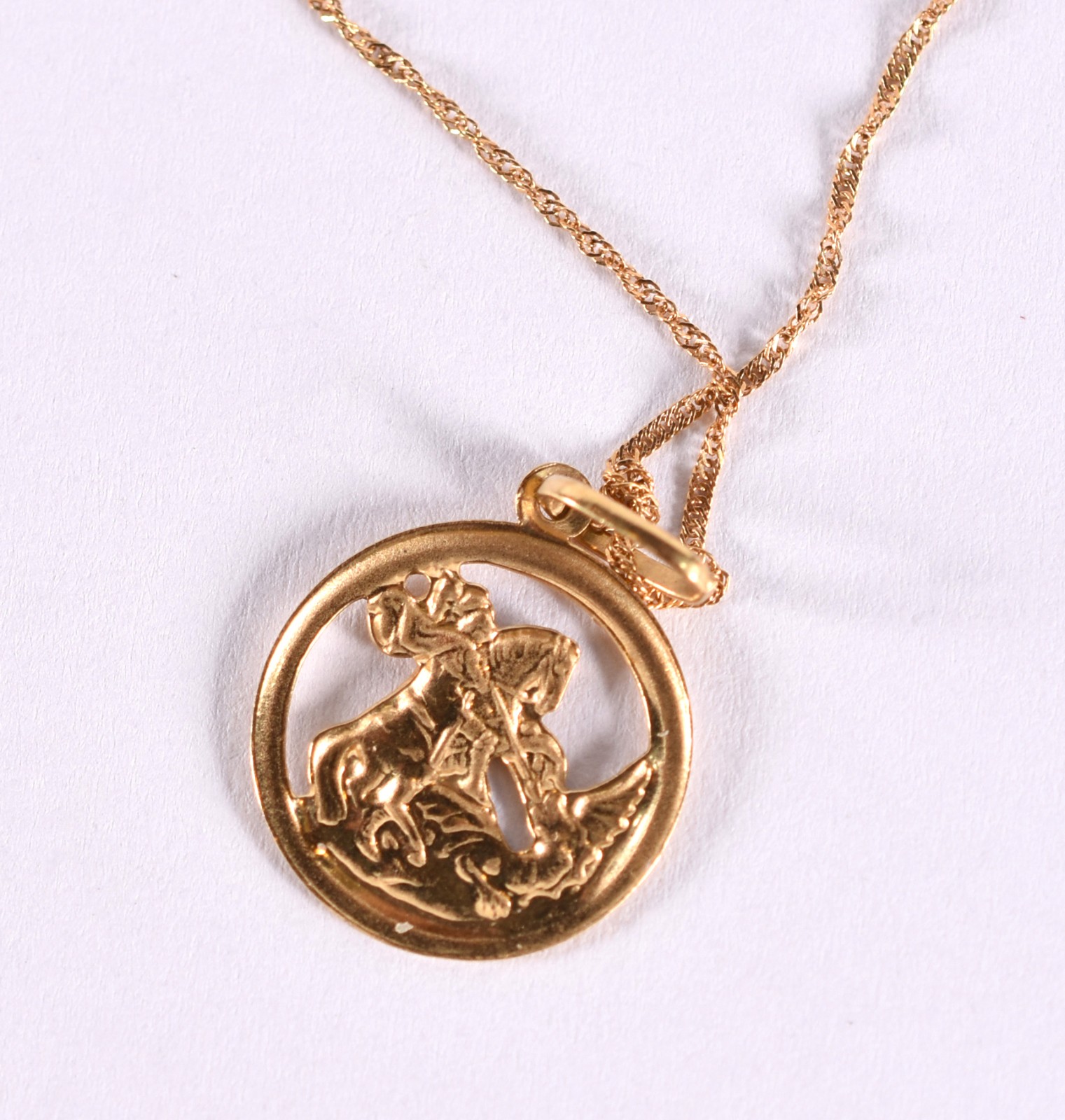 Colar de ouro 18 k, contraste 750 e pingente com imagem de São Jorge... - foto 5 de 5
