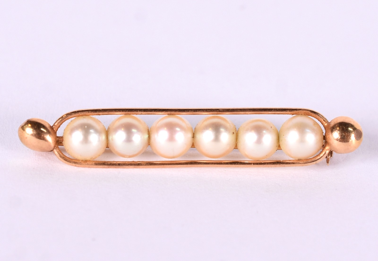 Broche de ouro baixo com 6 perolas (Por motivos de segurança a peça... - foto 1 de 3