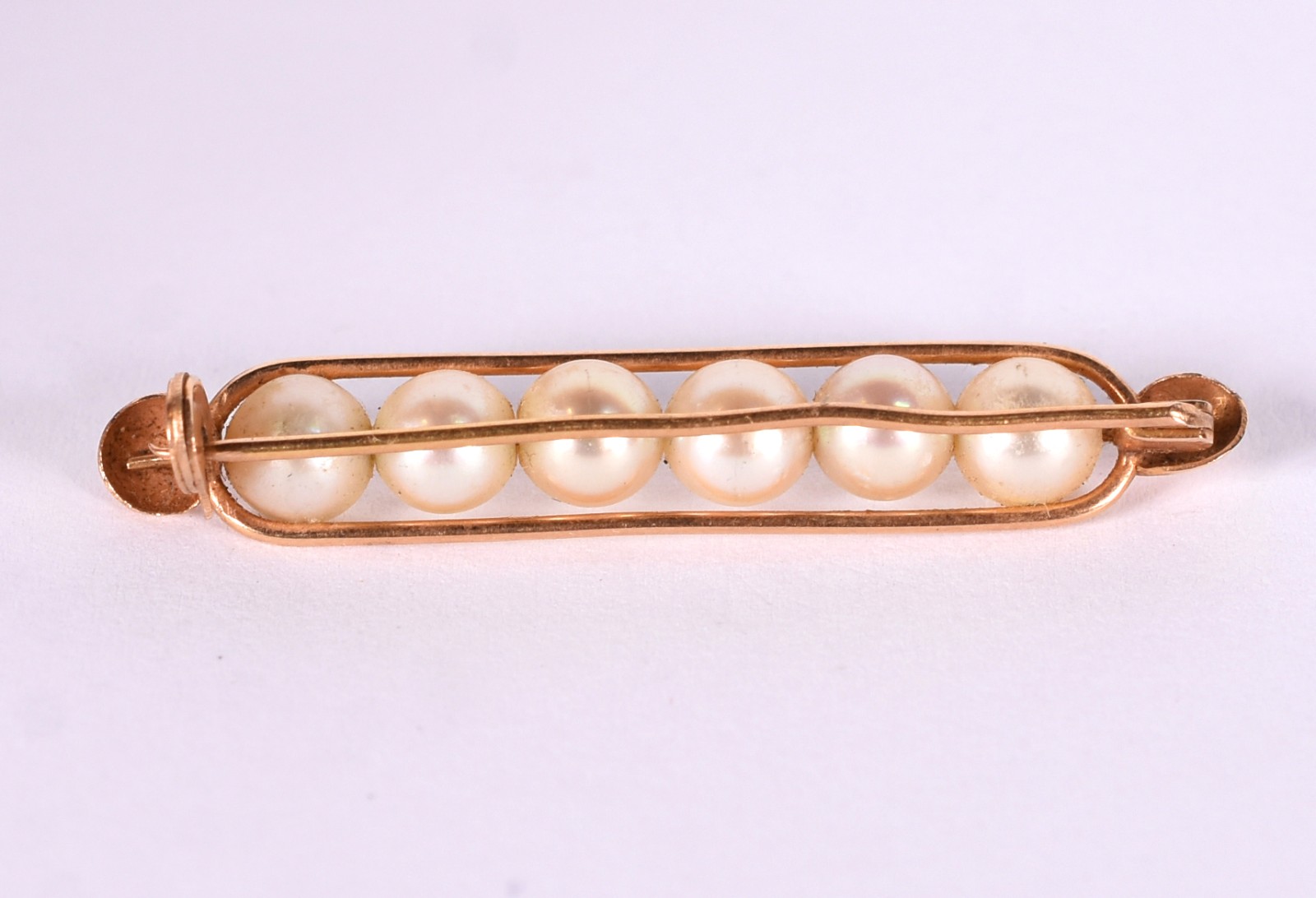 Broche de ouro baixo com 6 perolas (Por motivos de segurança a peça... - foto 3 de 3
