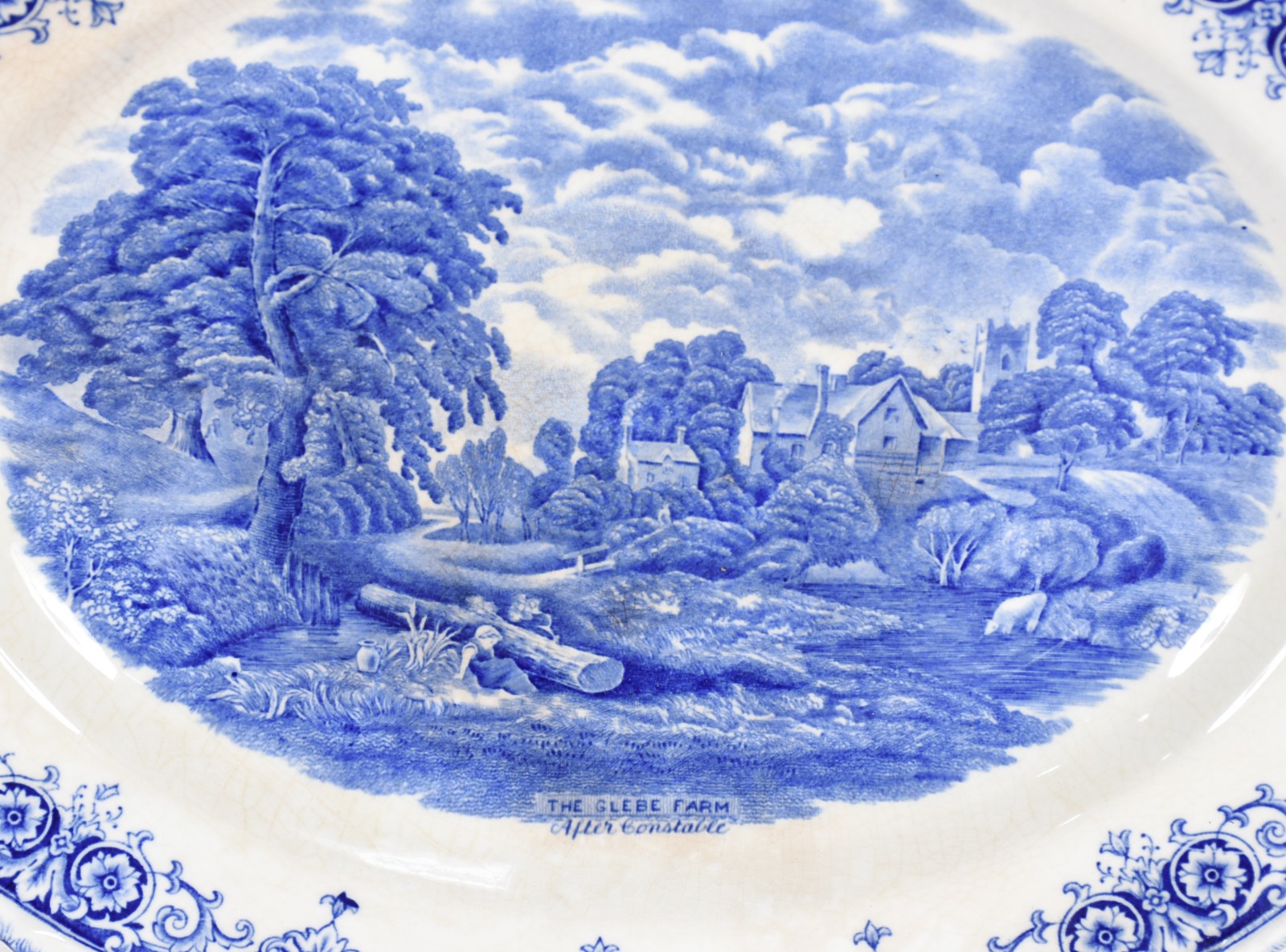 Duas travessas de faiança inglesa decoradas com paisagens em azul e... - foto 3 de 6