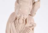 A.DE RANIERI (1880-1914),  - Três peças, sendo: abatjour de metal com figura de menino com boné assinado A.de Ranieri (d'après);  escultura de madeira representando menino com cân