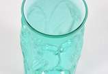 Vaso de vidro decorativo na cor verde com pássa... - Vaso de vidro decorativo na cor verde com pássaros em relevo.