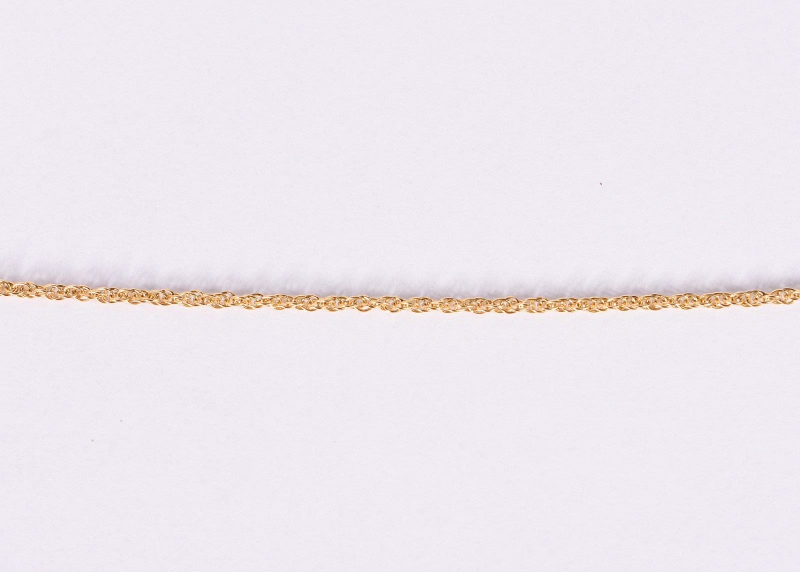 Cordão de ouro 18 k feitio trançado torcido (Por motivos de segurança... - foto 1 de 4