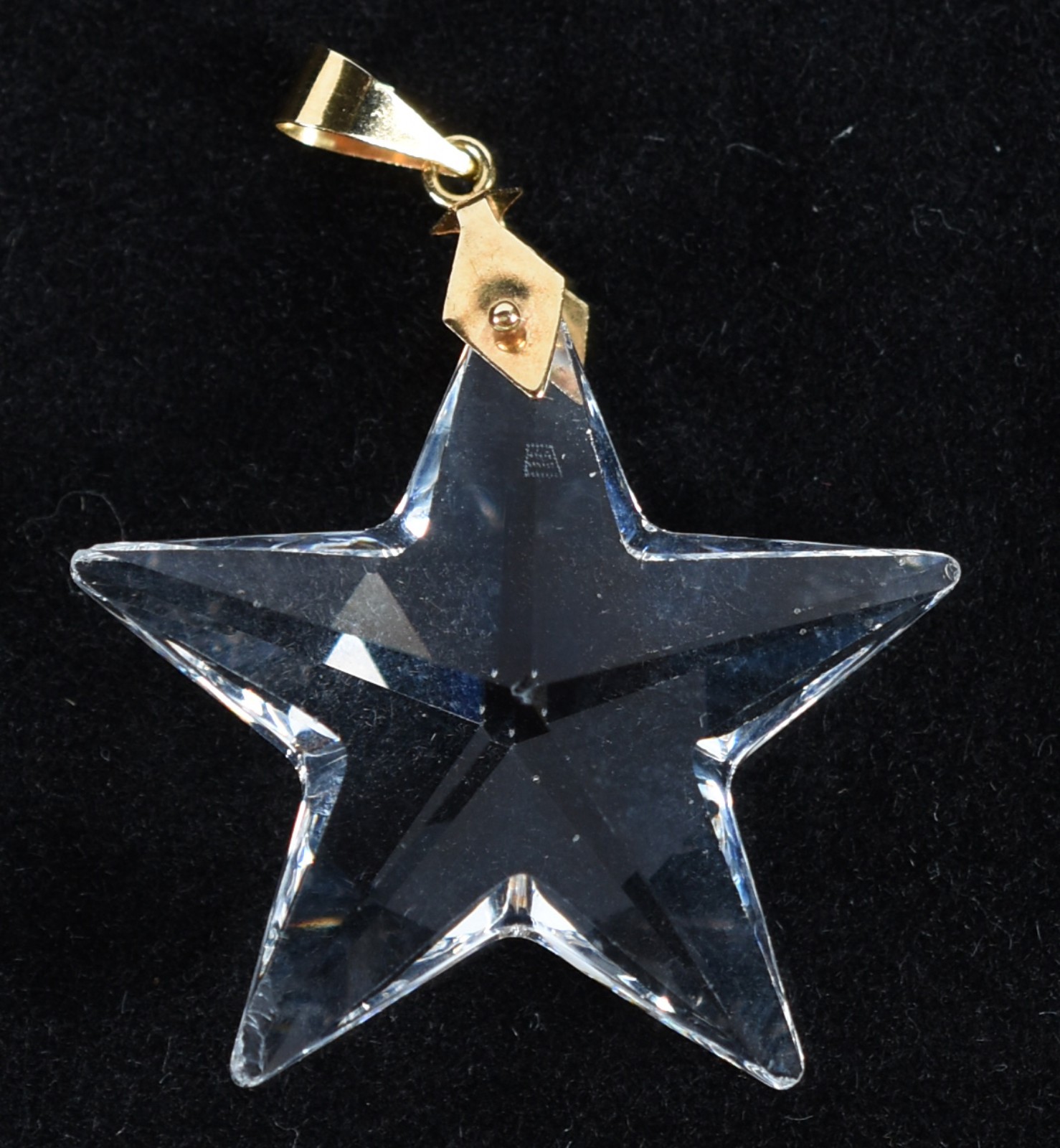 Pingente de ouro 18 k feitio estrela de cristal translucida (Por... - foto 1 de 4