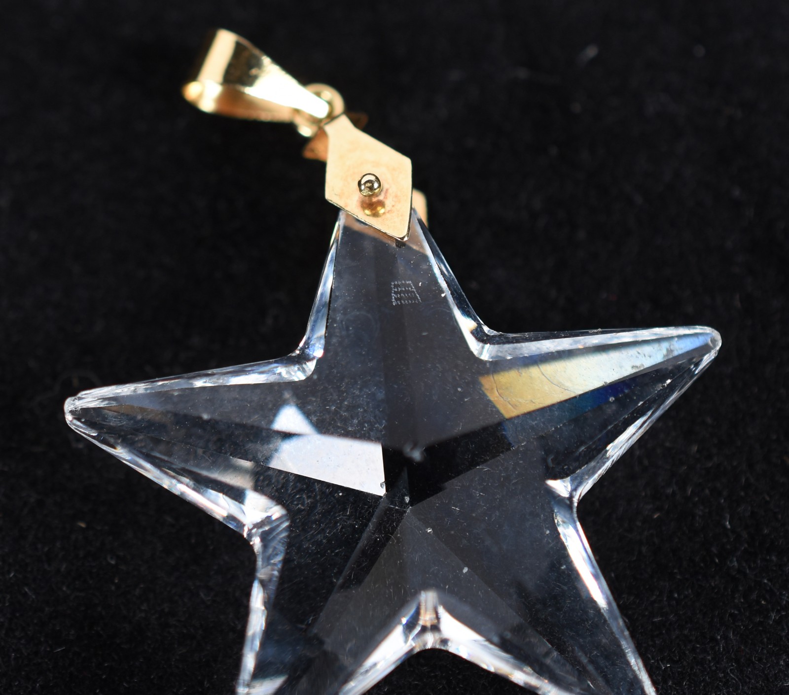 Pingente de ouro 18 k feitio estrela de cristal translucida (Por... - foto 2 de 4