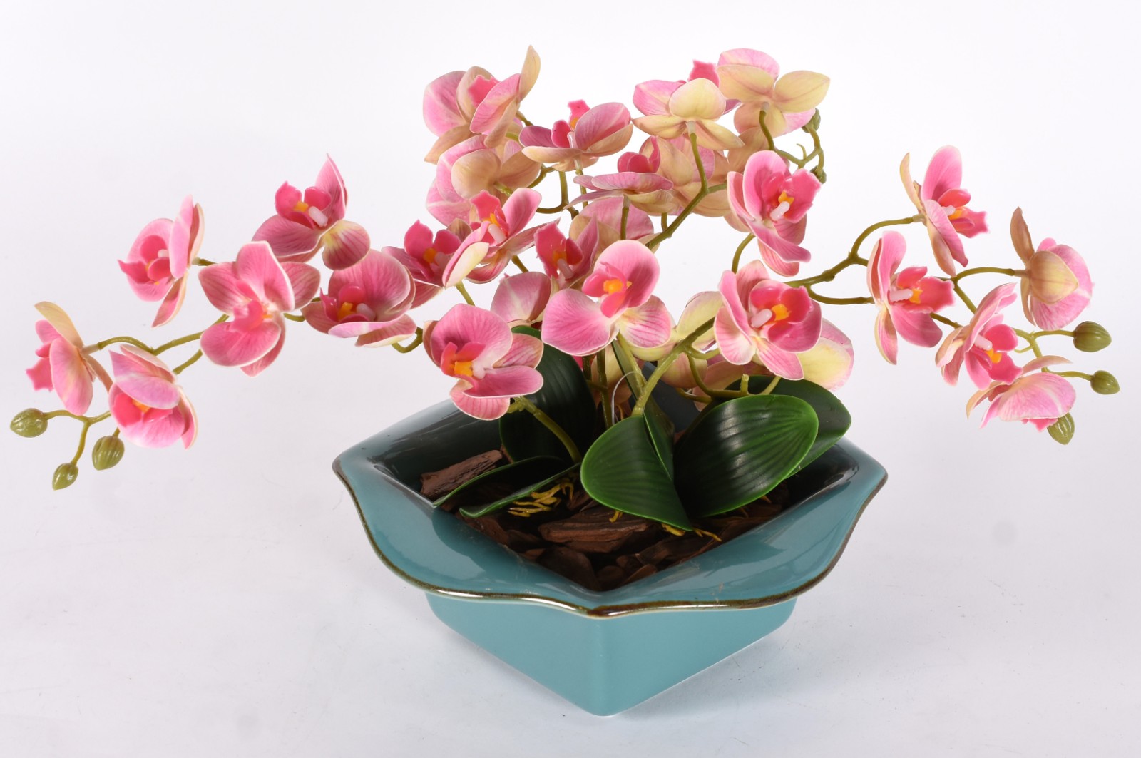 Cachepot de faiança azul com composição floral de orquídeas... - foto 1 de 3