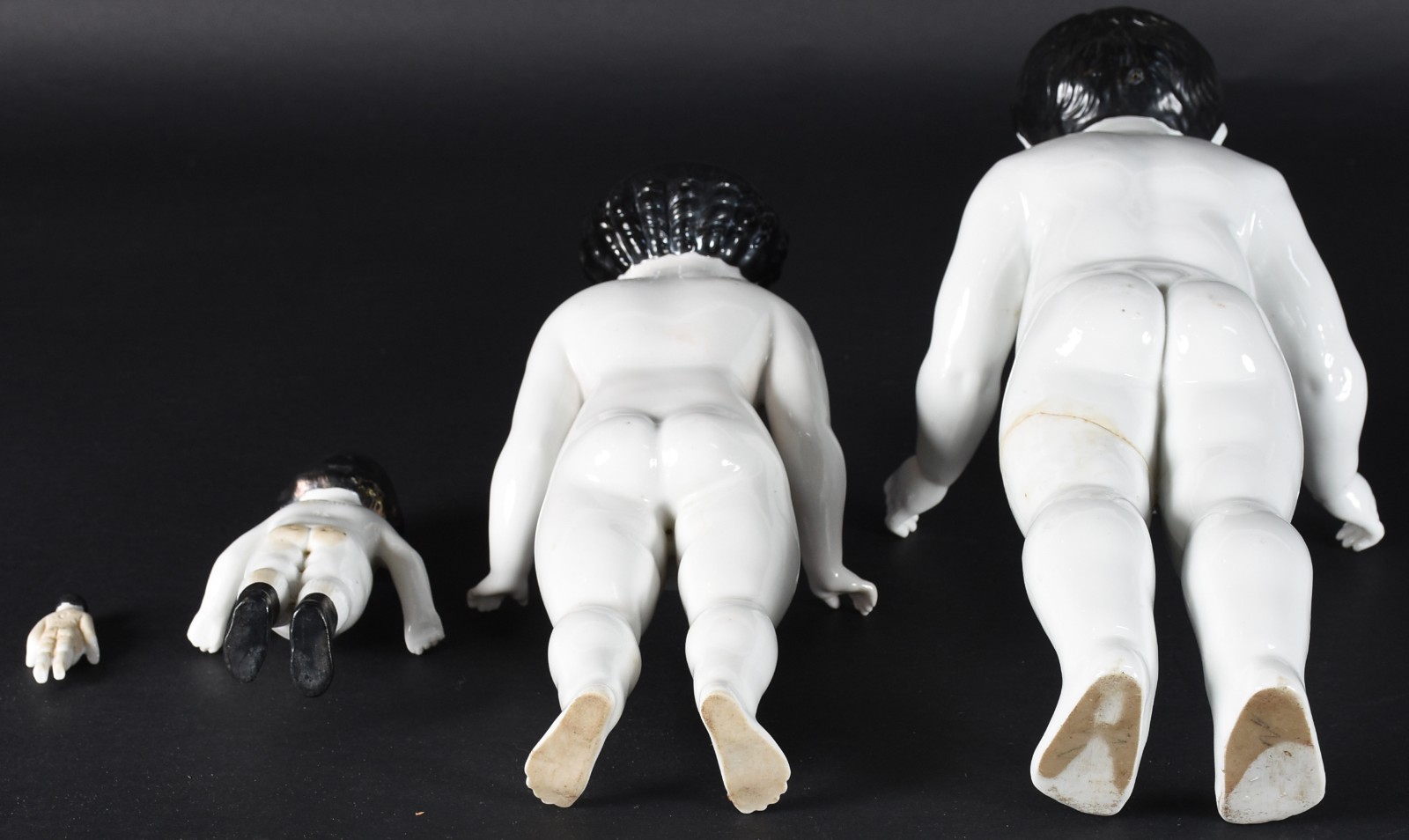 Quatro bonecas de porcelana policromada representando "Família"... - foto 7 de 9