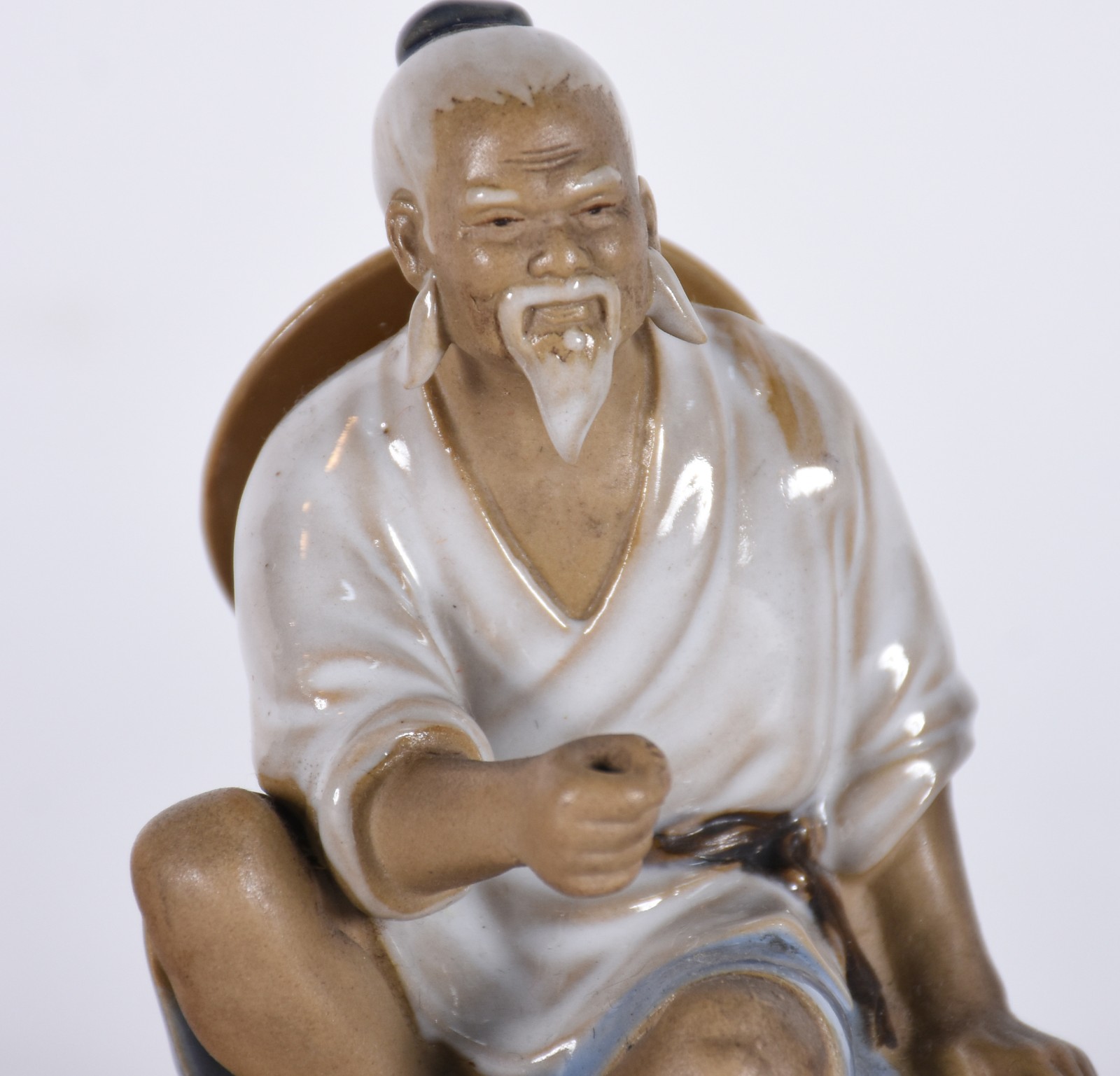 Três figuras orientais de porcelana policromada. - foto 2 de 4