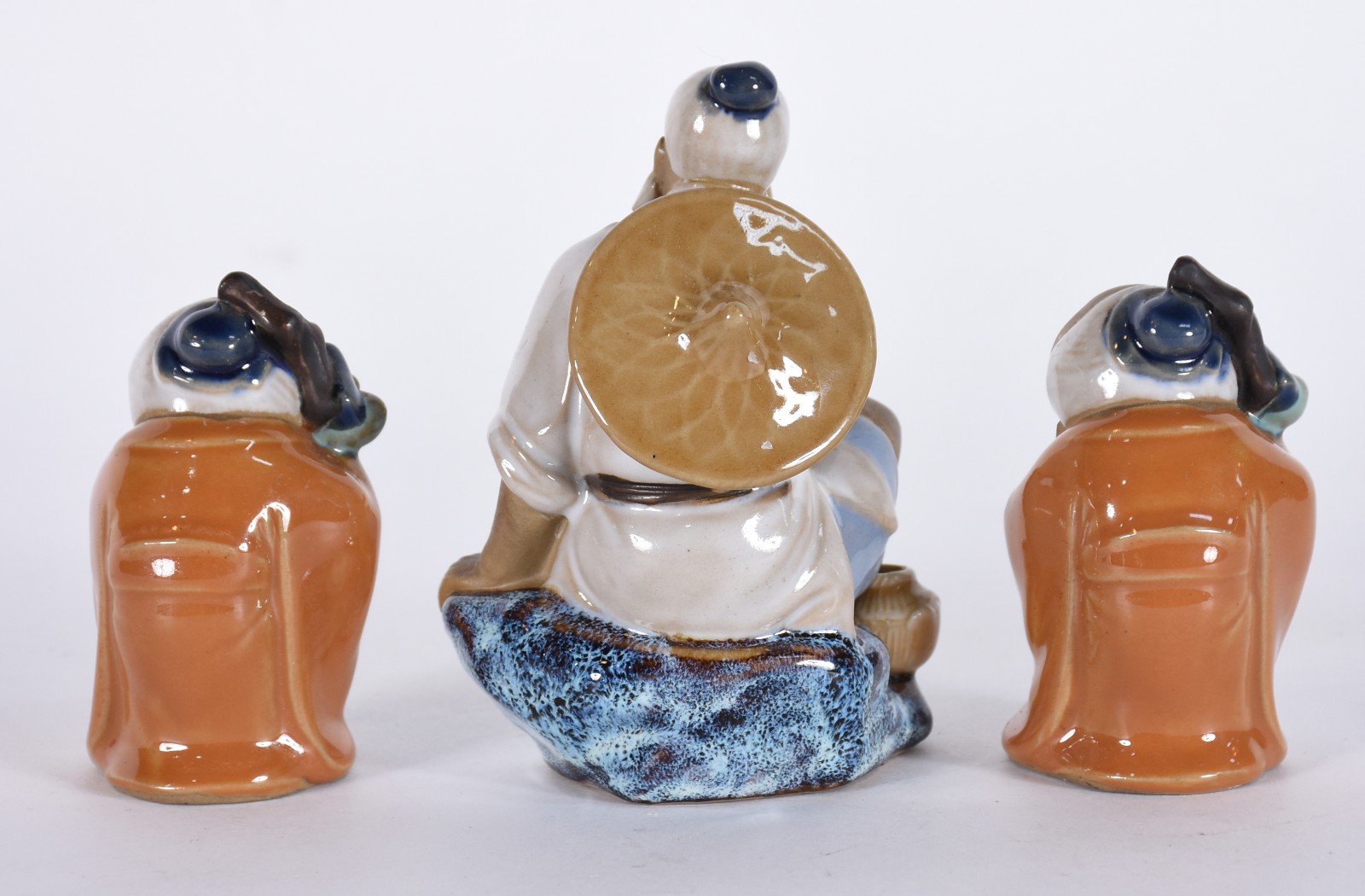 Três figuras orientais de porcelana policromada. - foto 3 de 4