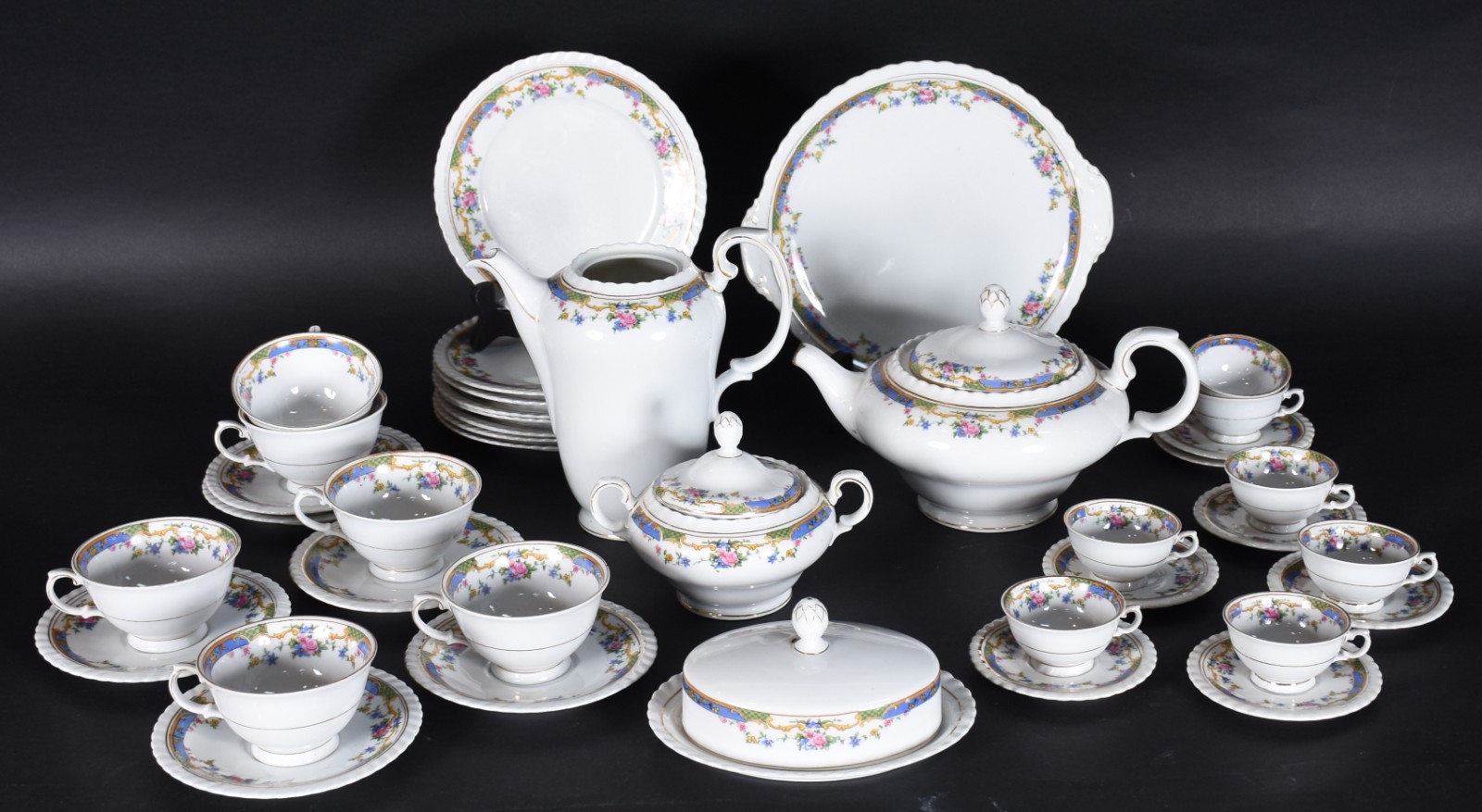 Serviço de chá e café de porcelana tcheca composto de: 4 xícaras de... - foto 1 de 6