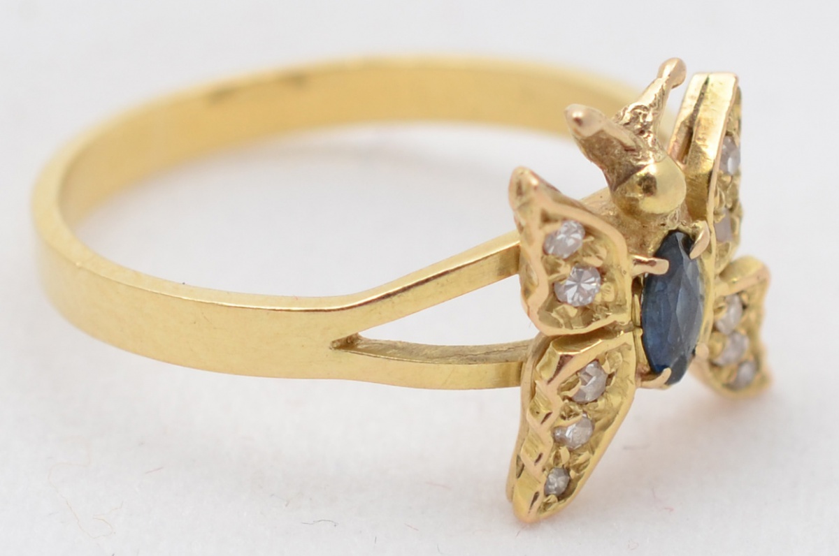 Anel tipo borboleta de ouro amarelo 18 k com 6 brilhantes. Aro 18... - foto 1 de 2