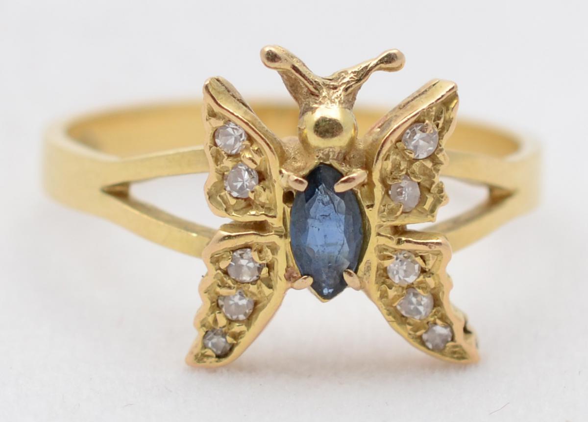 Anel tipo borboleta de ouro amarelo 18 k com 6 brilhantes. Aro 18... - foto 2 de 2