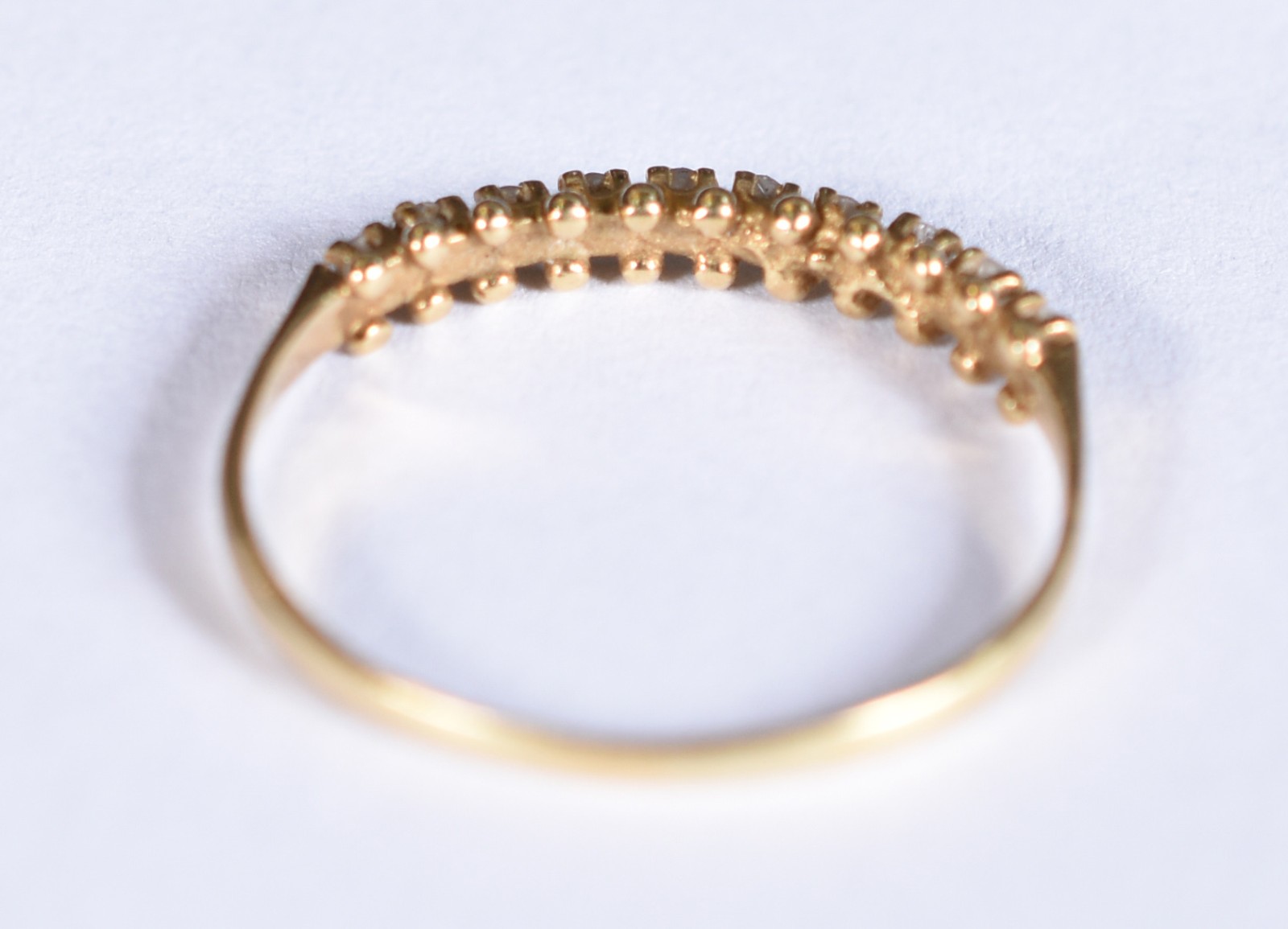 Meia aliança de ouro 18k, contraste 750 com 12 brilhantes, aro 18... - foto 3 de 3