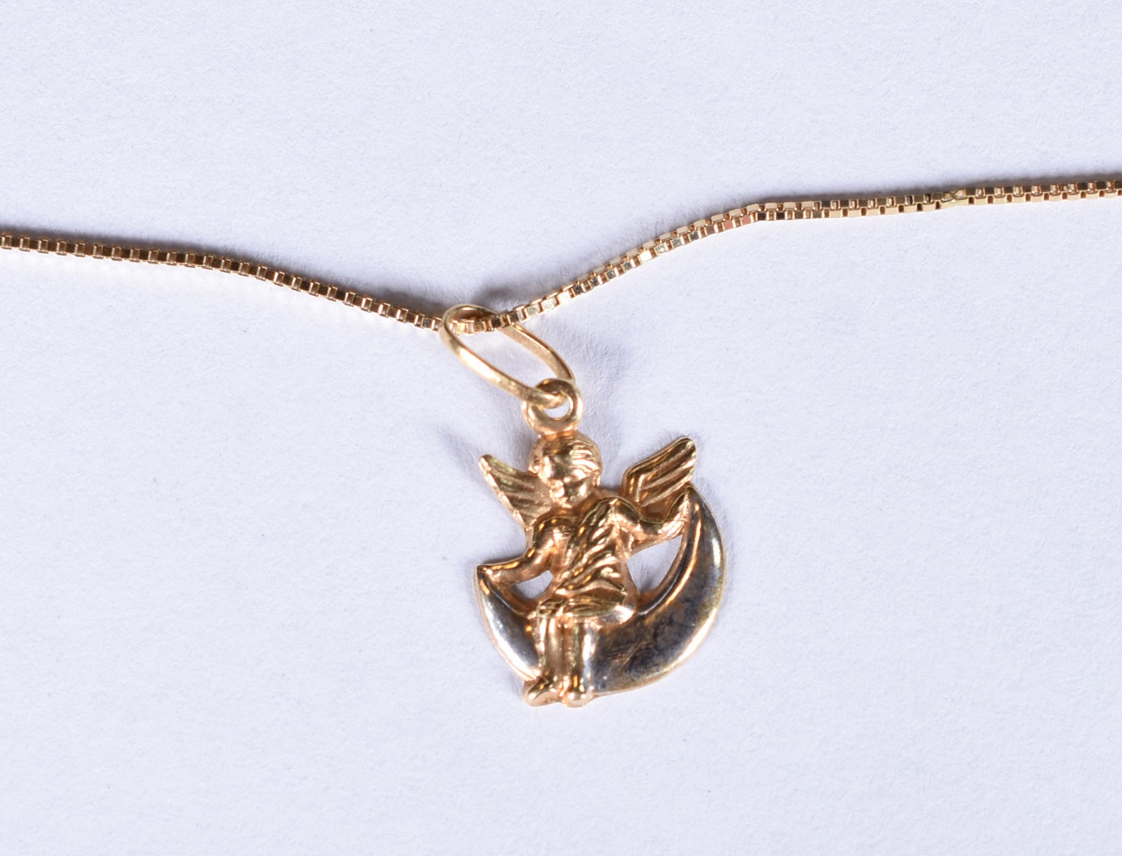 Colar de ouro amarelo, contraste 750 com pingente de guarda anjo (Por... - foto 1 de 5