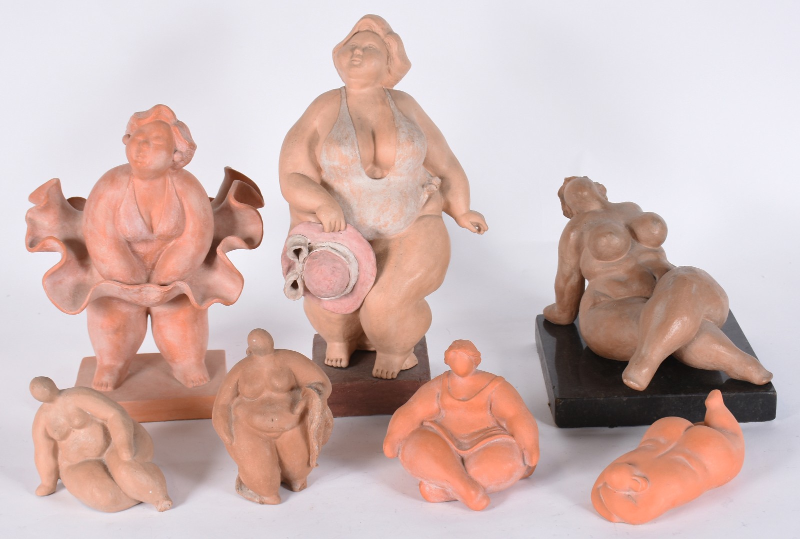 Arte popular - Sete estatuetas de barro cozido. - foto 1 de 9