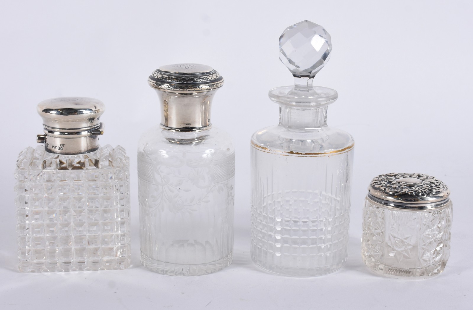 Quatro frascos de cristal europeu lapidado e tres deles com tampas de... - foto 1 de 6