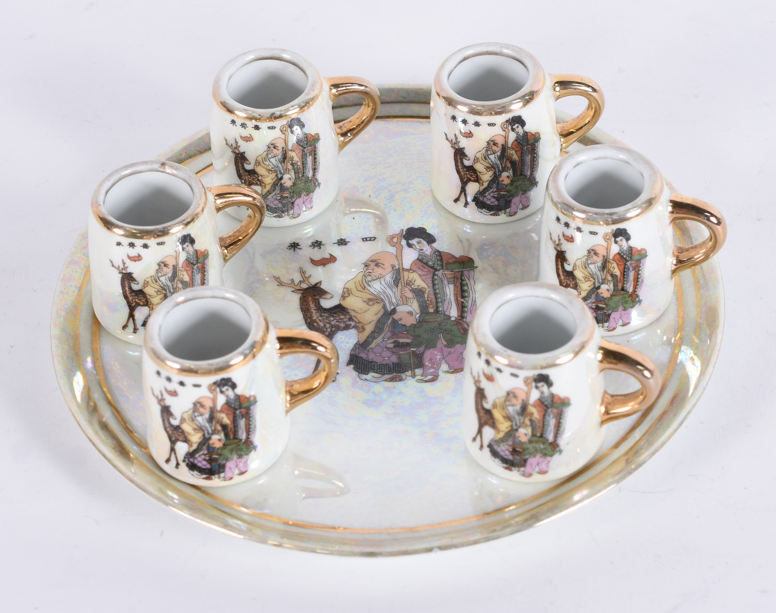 Jogo para saquê de porcelana policromada composto de 6 canequinhas e... - foto 1 de 7