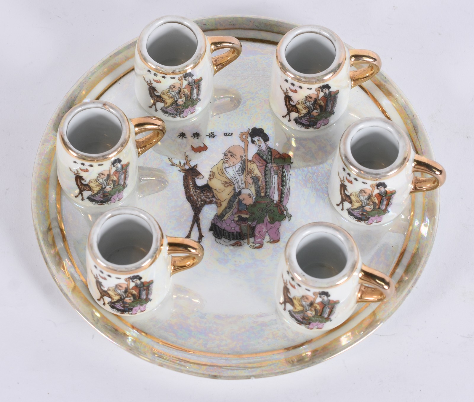 Jogo para saquê de porcelana policromada composto de 6 canequinhas e... - foto 2 de 7