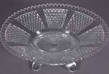 Baccarat (1764),  - Fruteira de cristal frances lapidado, feitio oval, bordas em gomos, base separada com quatro pés recurvos, fundo com estrela. Pequenos bicados.
