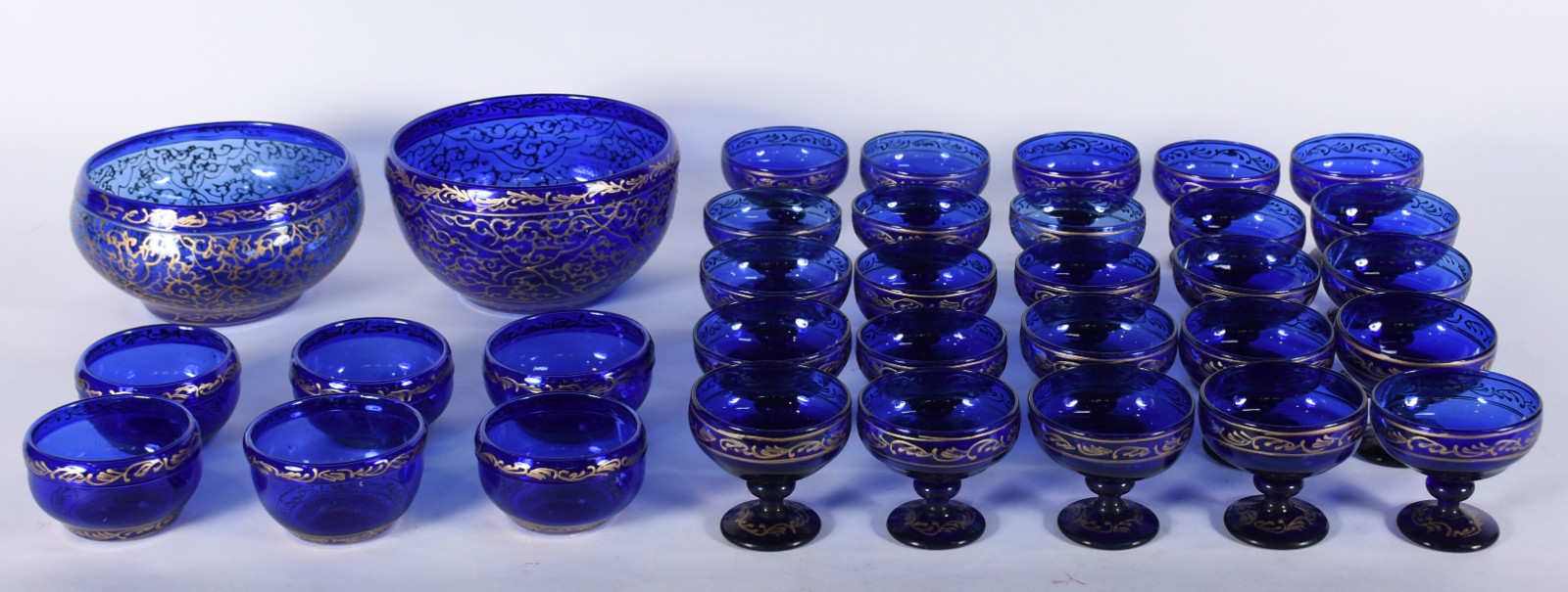 Serviço para sobremesa de vidro na cor azul com guirlandas esmaltadas... - foto 1 de 6