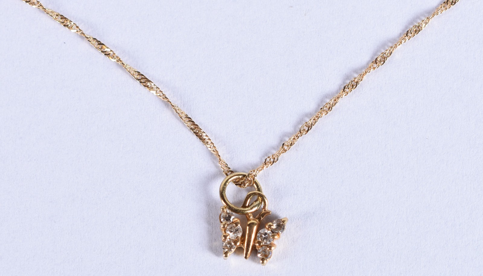 Cordão com pingente em ouro 18k contraste 750, cravejado de... - foto 1 de 5