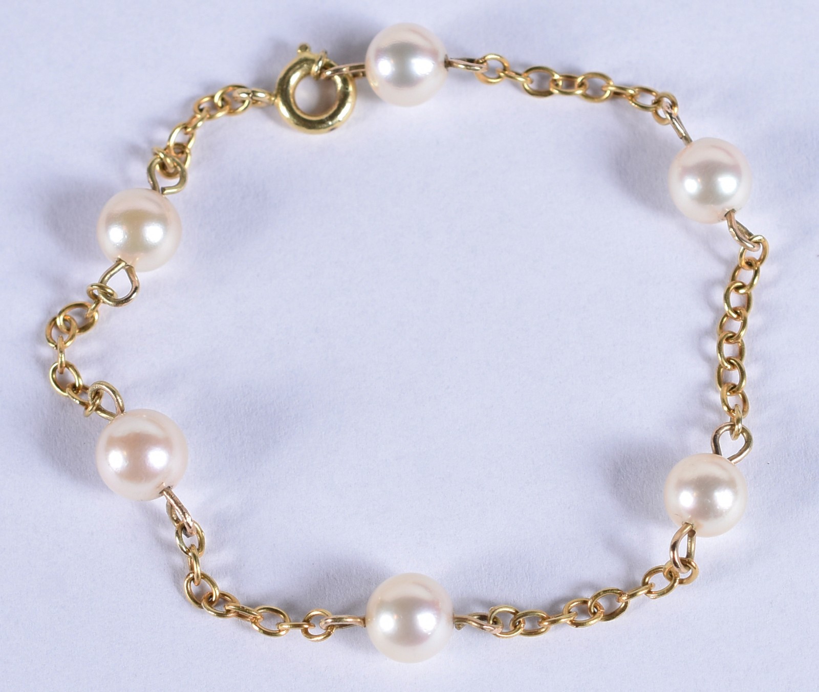 Pulseira em ouro 18k com 6 perolas intercaladas em correntes (Por... - foto 1 de 3